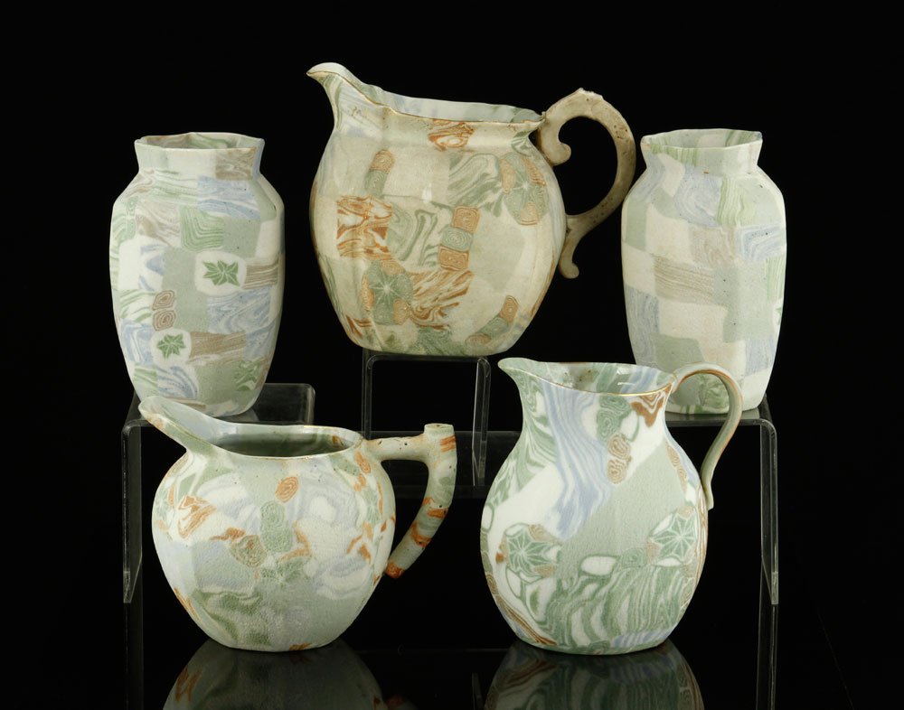 Lot of 19th C. Japanese Banko Wear: Five pieces of 19th century Japanese hand-thrown Banko ware, to include: three pitchers and two vases, marked on bottom, largest pitcher is 4 1/2" h x 5 1/2" w x 3 1/2" d. Provenance: From a Massachus