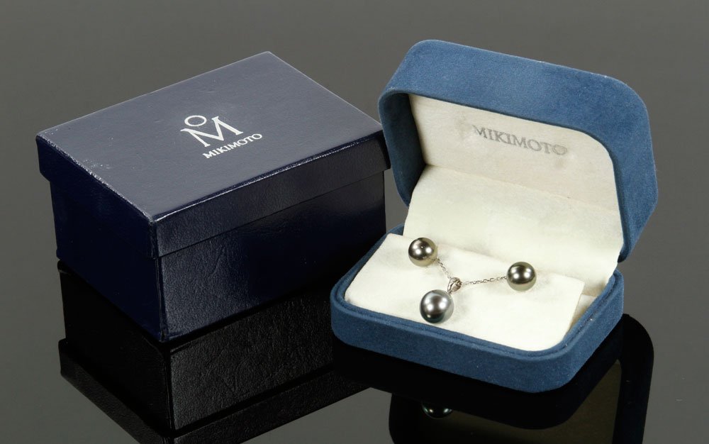 Mikimoto Tahitian Black Pearl Pendant and Earrings: Mikimoto Tahitian black pearl pendant and earrings, earrings are 10 mm, set in 18K gold, A+ pearl grade, pendant set in 18K white gold with 2 point diamond. Provenance: From a Florida estate.