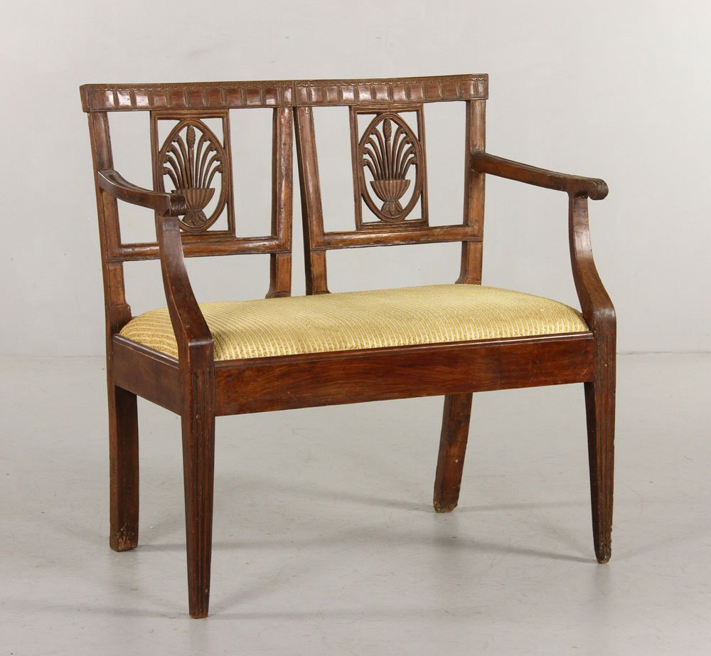 18th C. French Walnut Settee: 18th century French settee, walnut, with carved wreath and swag decoration, 34" h x 33" w x 19 1/2" d. Provenance: From a Massachusetts estate.