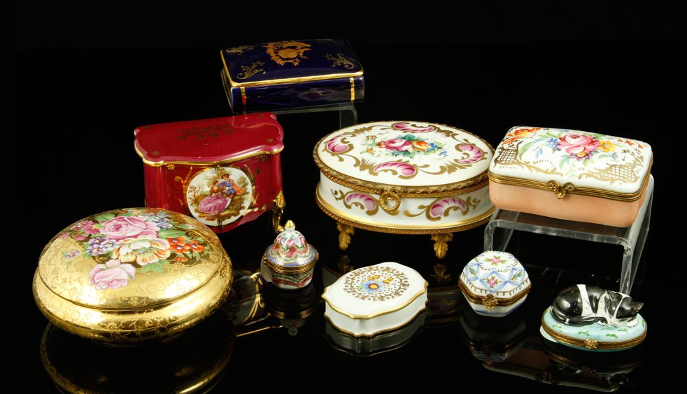 9 Limoges Trinket and Boudoir Boxes: Lot of nine Limoges trinket and boudoir boxes, largest hinged box is 5 1/2" h. Provenance: From a Massachusetts estate.