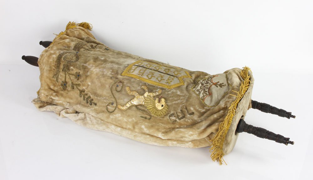 Torah with Hand Embroidered Cover: Torah, with hand embroidered beige cover, c. 1890-1920, Central European, written in Ashkenazi script with good black ink on parchment, 39" l from stave to stave. Provenance: From a Massachusetts esta
