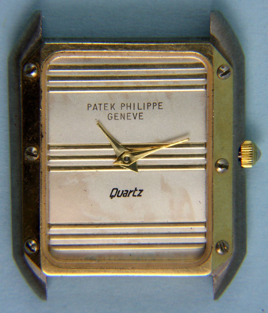 Patek Philippe Quartz Men's Wristwatch: Patek Philippe quartz men's wristwatch, 1 1/4"h x 1"w. Lacks band pins and band, not tested.