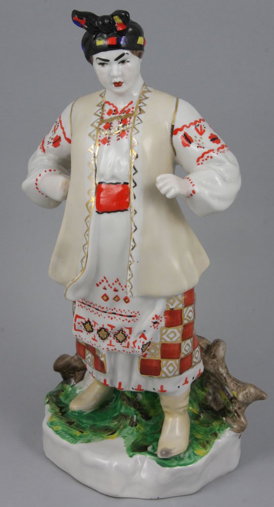 Russian Porcelain Figure: Mid 20th century Russian porcelain figure of Odarka, a hero of the Ukrainian epos, from the Kiev Porcelain Factory, 9 3/4" h.