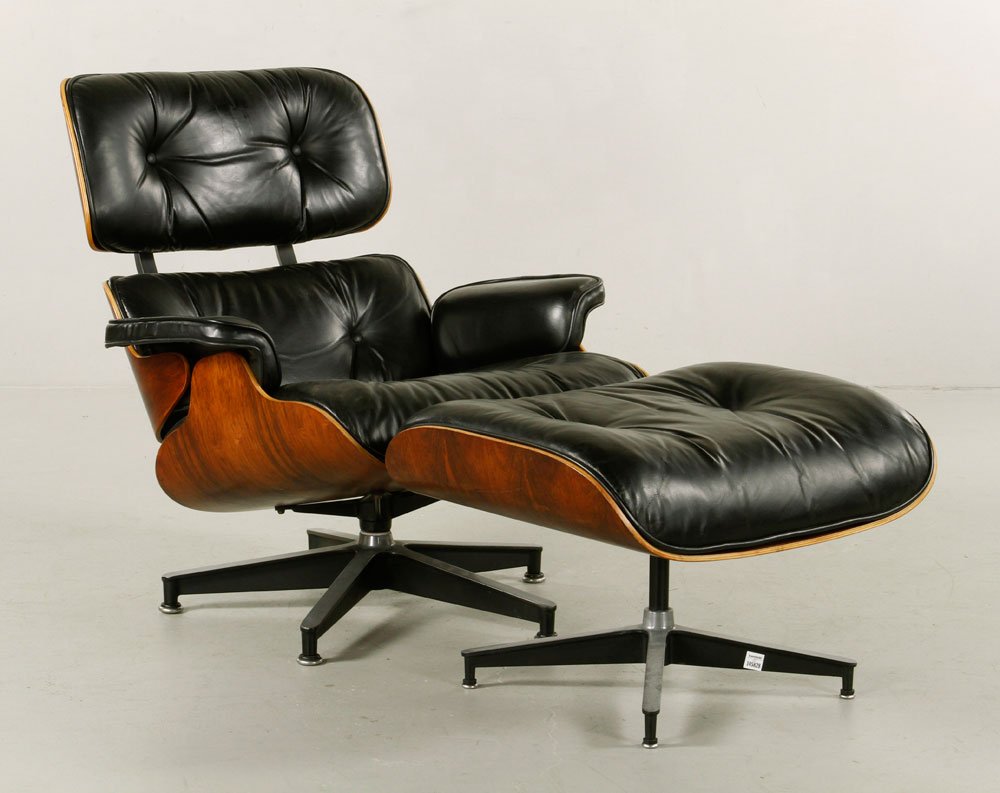 Eames for Miller Chair and Ottoman: Charles and Ray Eames for Herman Miller chair (#670) and ottoman (#671), 31"h x 30"w x 34"d (chair), 16"h x 26"w x 21"d (ottoman). Provenance: From a MA estate.