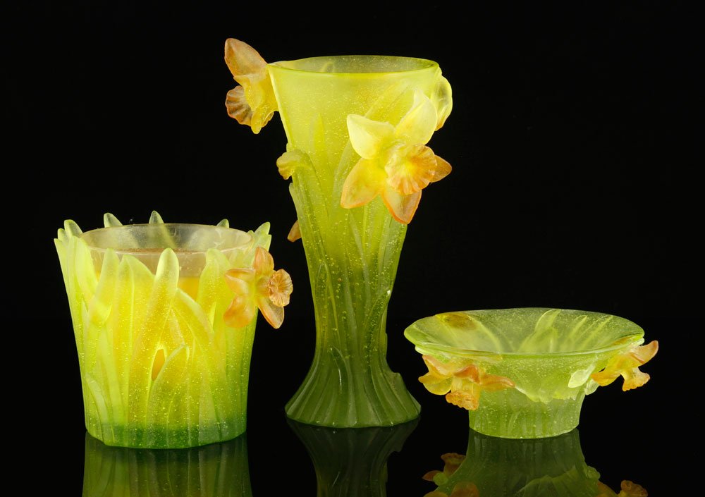 3 Daum Pate de Verre "Daffodil" Items: 3 Daum pate de verre "Daffodil" items, to include: one small vase, etched underside "Daum France", 7 1/2"h x 5"w; one compote bowl, etched underside "Daum France", 2"h x 5 1/4"dia.; one candleholder w