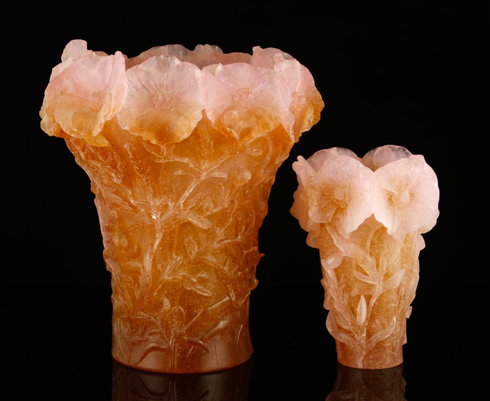 2 Daum Pate de Verre "Hibiscus" Vases: Daum pate de verre "Hibiscus" vases, etched underside "Daum France", purchased in Paris, France, 10"h x 9 3/4"dia., 7"h x 5"dia. Provenance: From a MA estate.