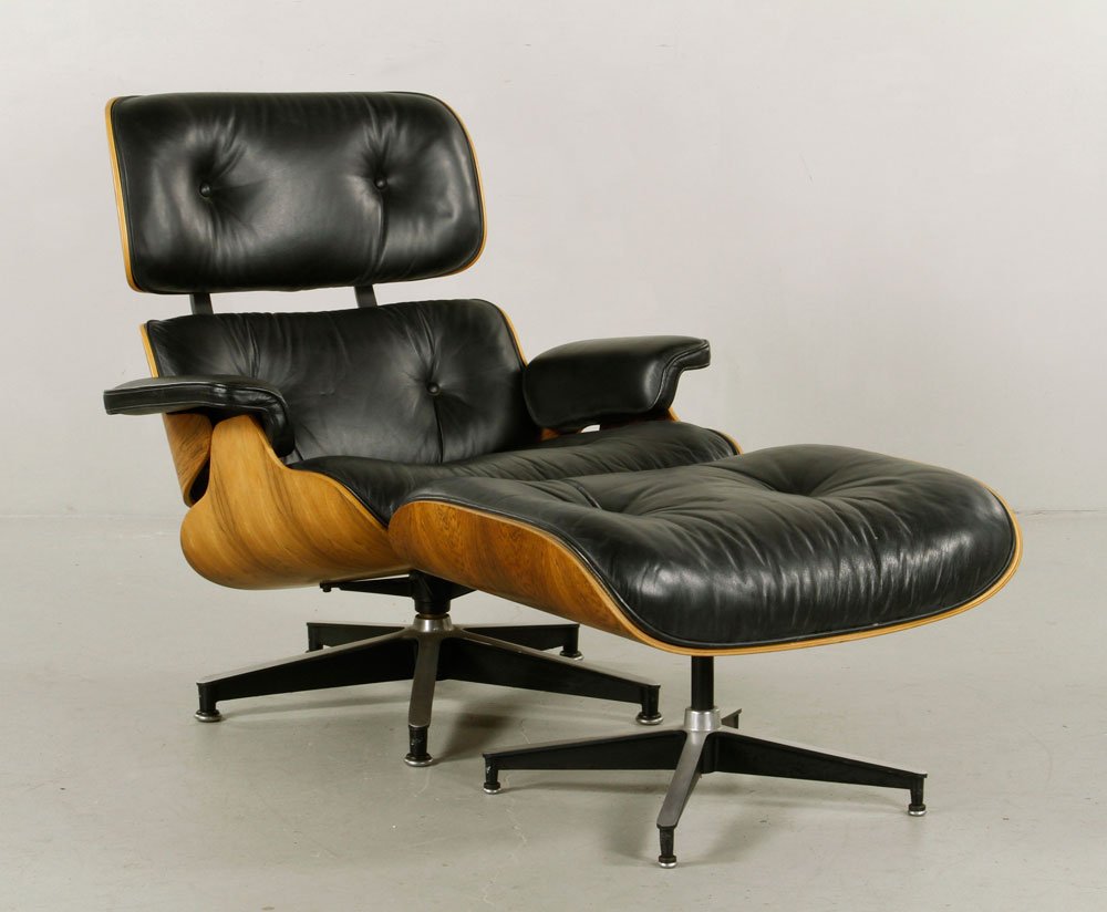 Eames for Miller Chair and Ottoman: Charles and Ray Eames for Herman Miller chair (#670) and ottoman (#671), 31"h x 30"w x 34"d (chair), 16"h x 26"w x 21"d (ottoman). Provenance: From a MA estate.