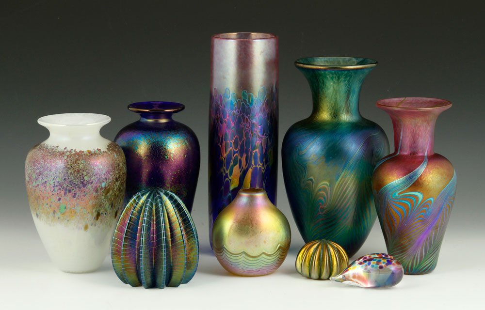 9 Held Art Glass Pieces: Lot of Robert Held (Canadian) iridescent art glass pieces, nine total, all marked "R. Held Art Glass", including three paperweights and six vases, 10 1/2"h (tallest). Provenance: From a MA estate.