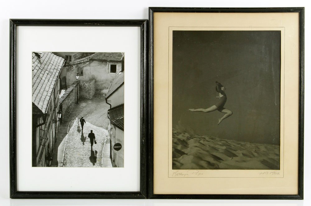 Lot of 2 Photographs: Lot of 2 photographs: one depicting a gymnast, signed Kathryn Pope, 13"h x 10"w (view), 18"h x 14"w (frame); one depicting a European street scene, unsigned, 11"h x 19"w (view), 17"h x 13"w (frame). P