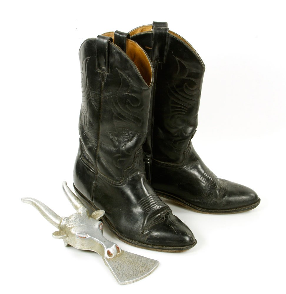 Pr. Rex Trailer's Personal Cowboy Boots: Pair of Rex Trailer's personal cowboy boots, with stitched design, along with Rex's steer form boot jack. Provenance: From the estate of Rex Trailer and the WBZ-TV production "Boomtown."