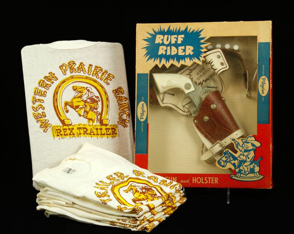 "Boomtown" Children's Lot: "Boomtown" children's lot, to include: "Ruff Rider" Hubley Marshal pistol with "Rex Trailer" holster and belt, new in box, and six "Rex Trailer Ranch Junior Cowboy" tee-shirts, boys' size 12. These it