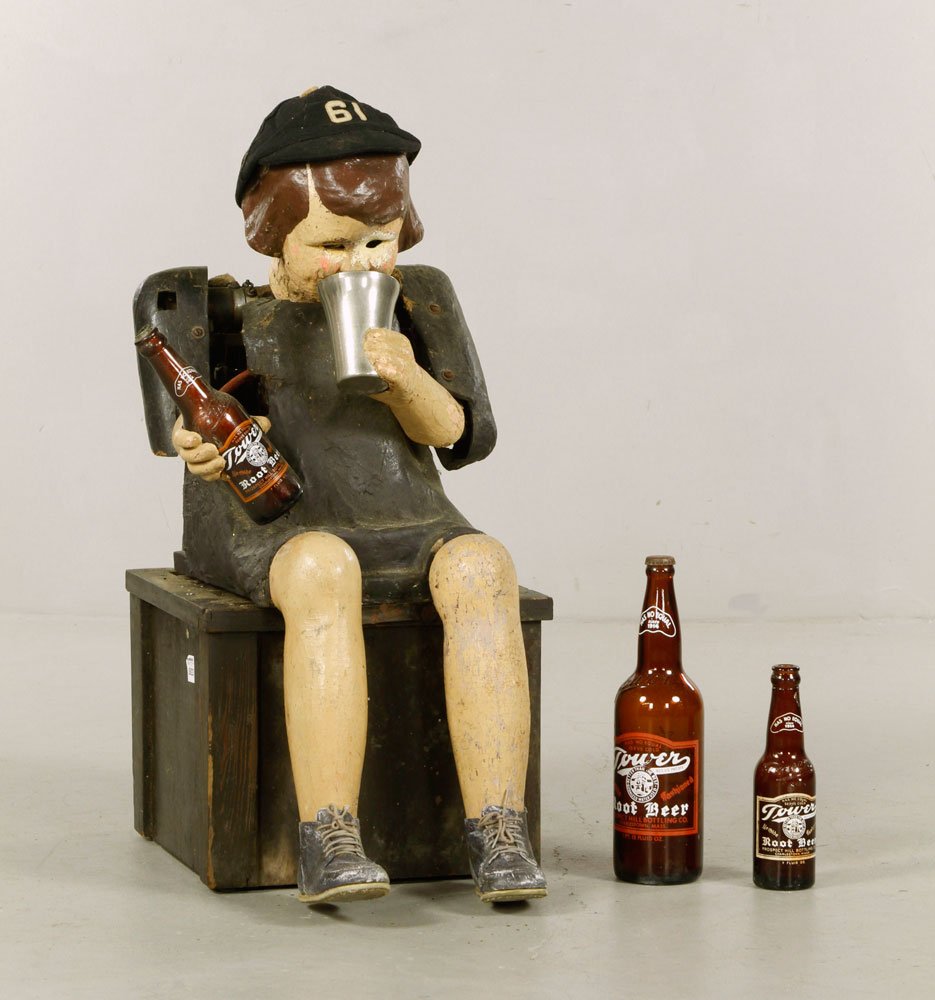 Tower Root Beer Automaton: Tower Root Beer automaton, with electric cord and detachable legs, with two extra root beer bottles and wood carrying case, 28" h x 13 1/4" w x 13 1/2" d. Provenance: From a Massachusetts estate.