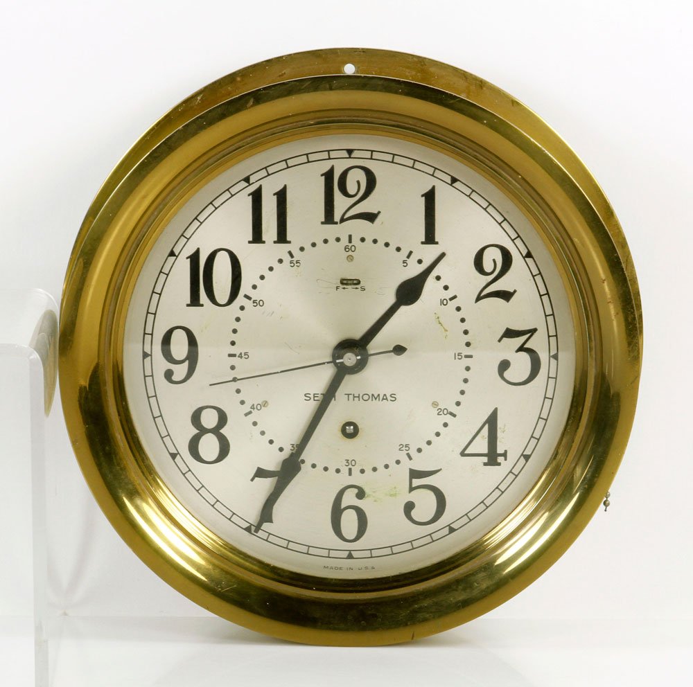 Seth Thomas Brass Ship's Clock: Seth Thomas ship's clock, brass, 11" dia x 3" d. Provenance: From a Massachusetts estate.