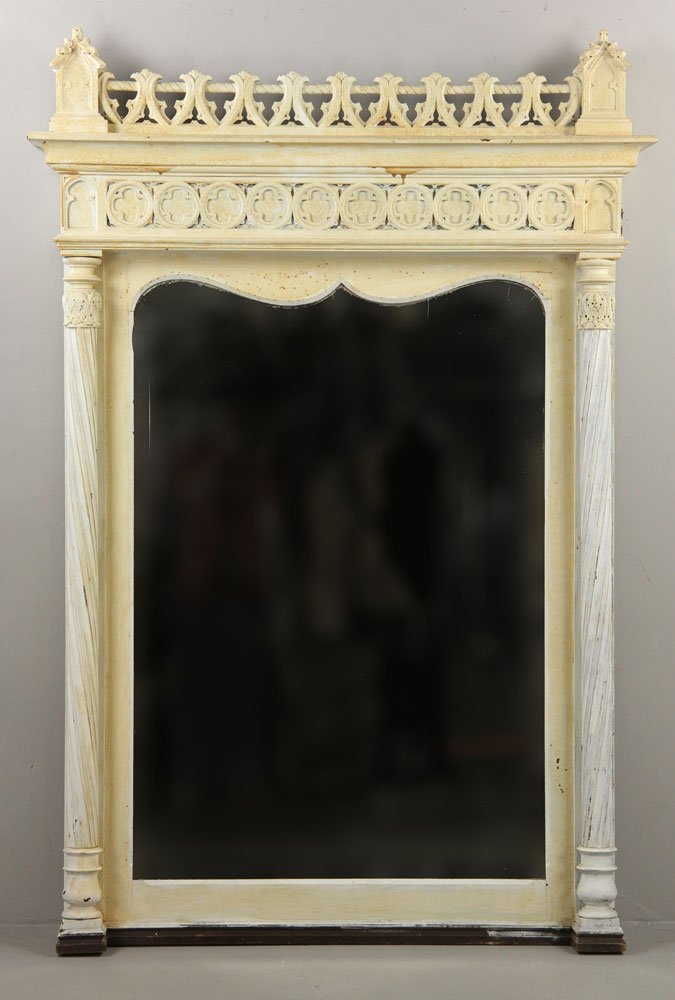 19th C. Gothic Revival Painted Mirror: 19th century Gothic revival mirror, white painted wood, 63" h x 42" w x 6 1/2" d. Provenance: From the Palm Beach, FL estate of Ivana Trump, thence to present owner.