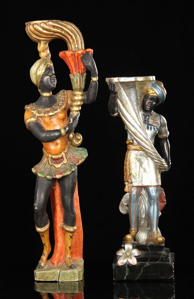 Pr. Italian Carved Wood Blackamoor Figures: Pair of Italian blackamoor figures, carved wood and plaster, one 22" h, the other 17" h. Provenance: From the estate of A. V. G. Hacyshlavn, Watermill, South Hampton, NY.