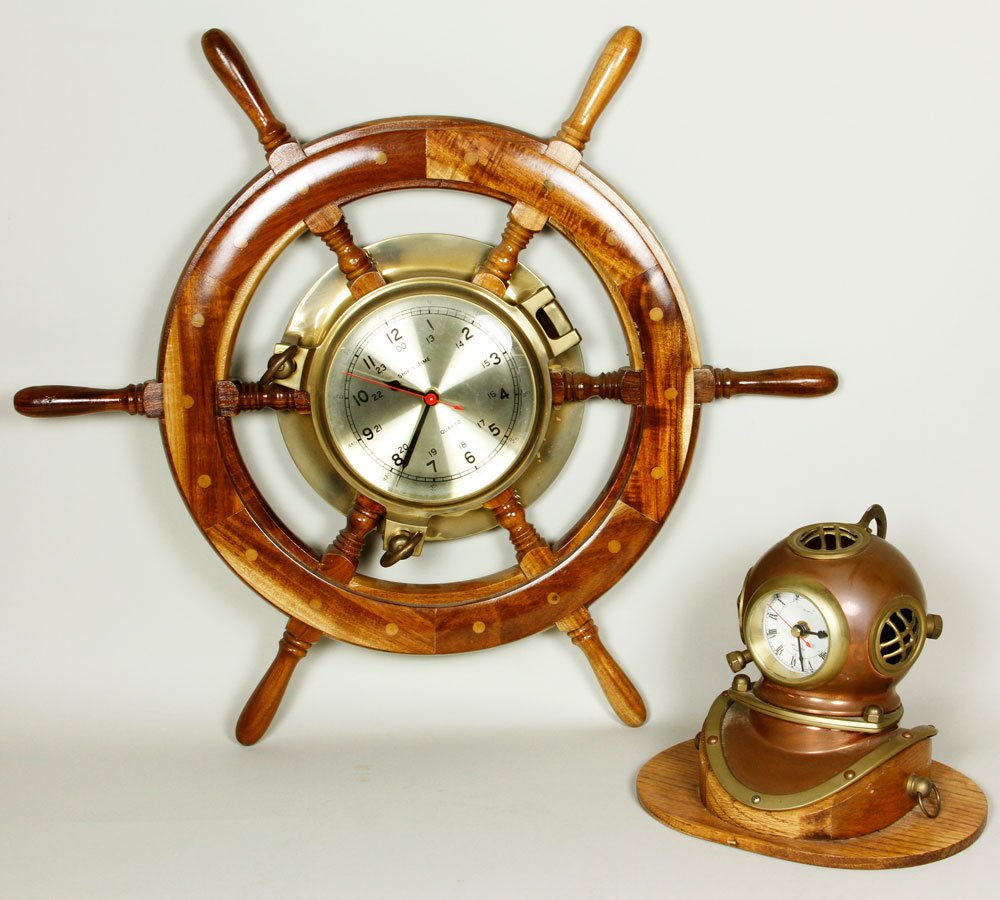 Ship's Wheel Clock and Clock Helmet: Ship's wheel clock and clock helmet, 23".