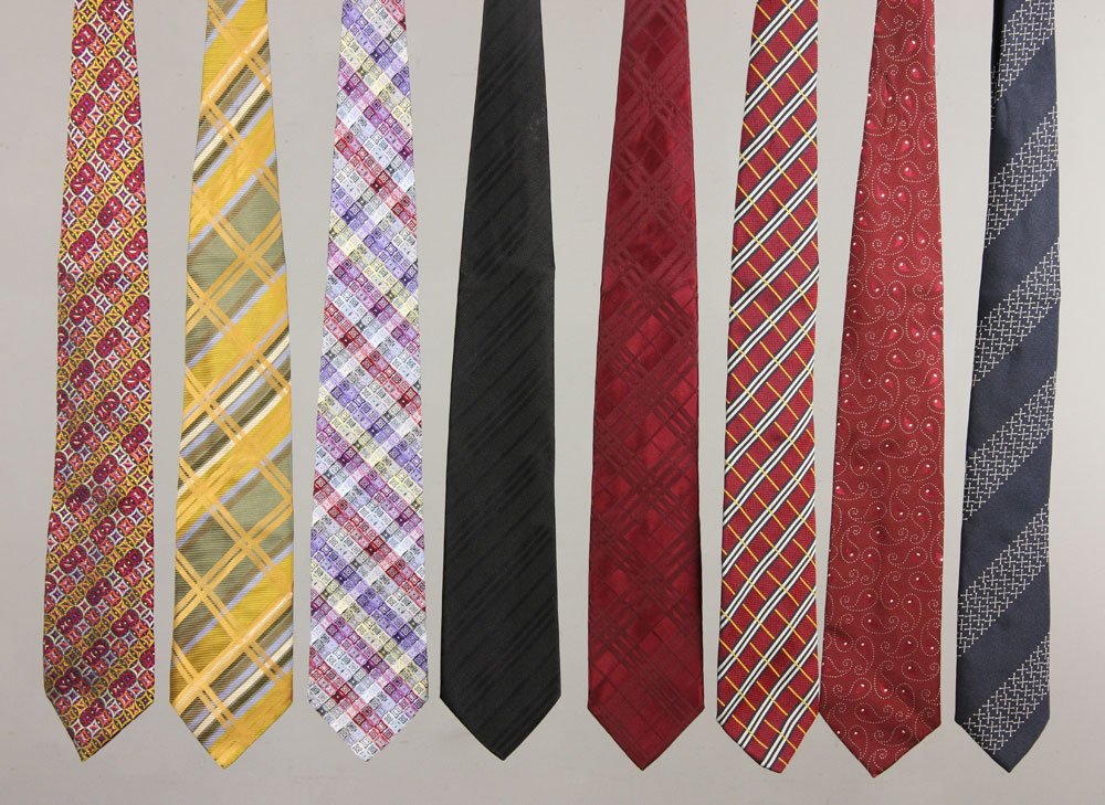 Collection of 8 Men's Ties: Collection of eight men's ties, to include: four ties from Burberry, two ties from Duchamp, one tie from Dunhill, and one tie from Barker Black. Provenance: From a California estate.