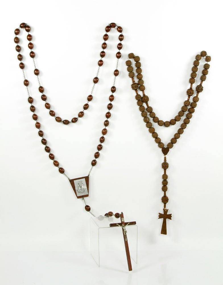 Lot of 2 Italian Rosaries: Lot of two Italian rosaries, wood, hand carved, one measuring 52" l, the other measuring 68" l. Provenance: Unreserved collection of Mrs. Jackie Pearson of San Diego, California.