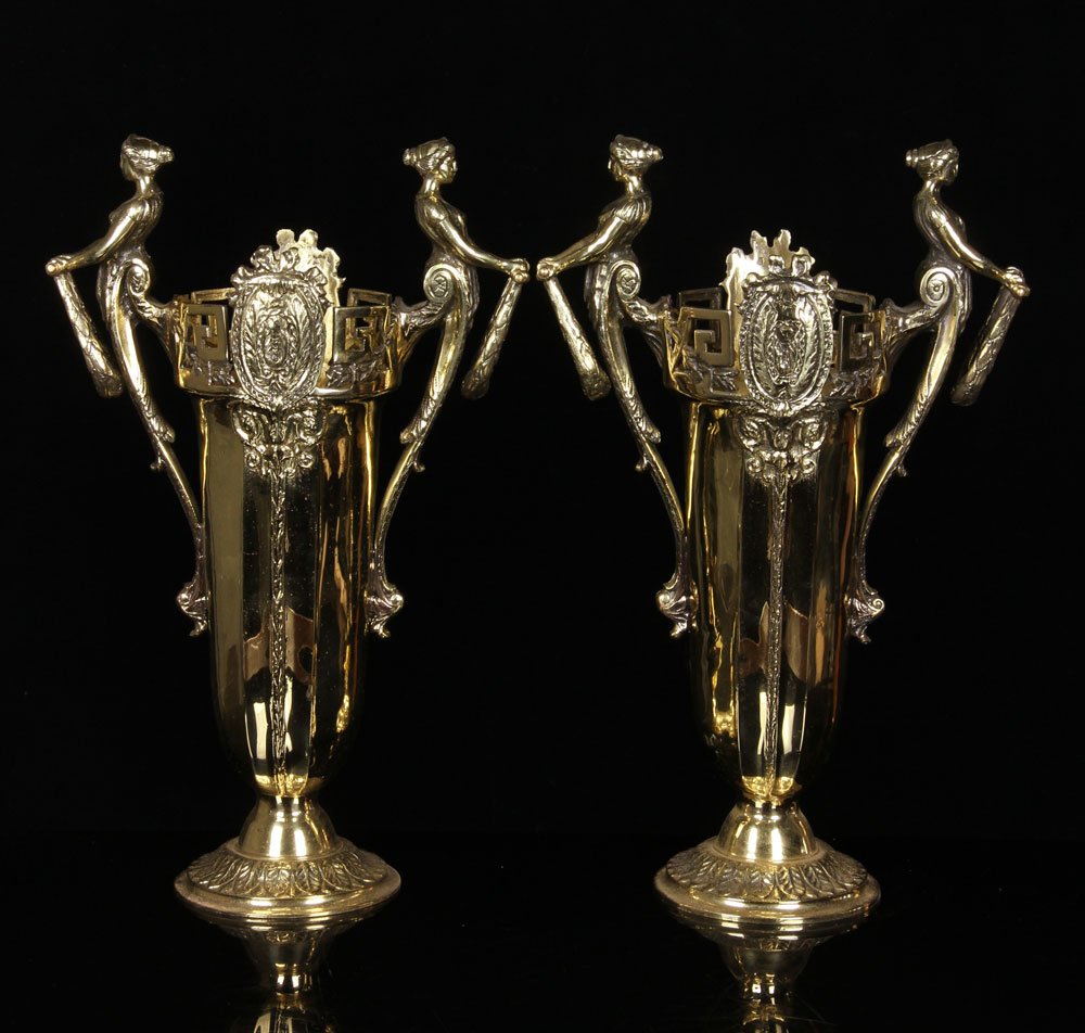 Pr. Classical-Style Urns with Figural Handles, Bronze: Pair of classical-style urns with figural handles, bronze, 20" h x 13" w x 6" dia across handles. Provenance: From the unreserved collection of Mrs. Jackie Pearson of San Diego, California.