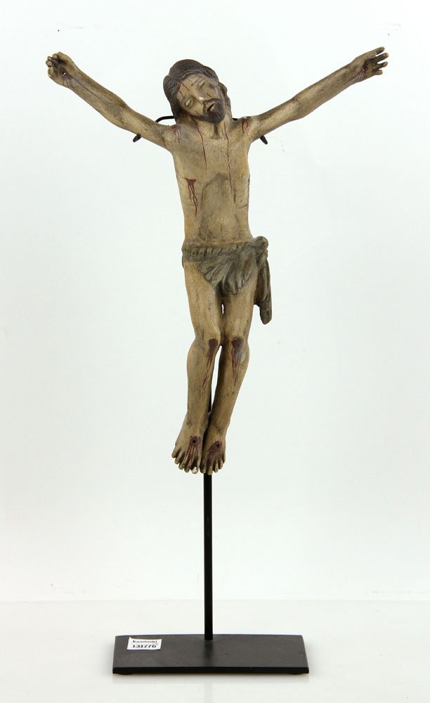 Antique Mexican Crucifix: Antique Mexican crucifix, painted wood on an iron stand, 13" h x 10" w (crucifix), 18" h (on stand). Provenance: From the unreserved collection of Mrs. Jackie Pearson of San Diego, California.