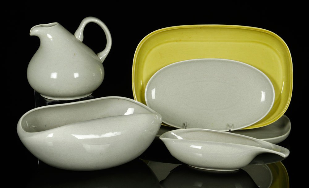 Russel Wright Serving Pieces: Lot of Russel Wright serving pieces, to include: three trays, two bowls, one pitcher (6 1/2" h), largest tray 13 1/4" l x 9" w. Provenance: From a Massachusetts collection.