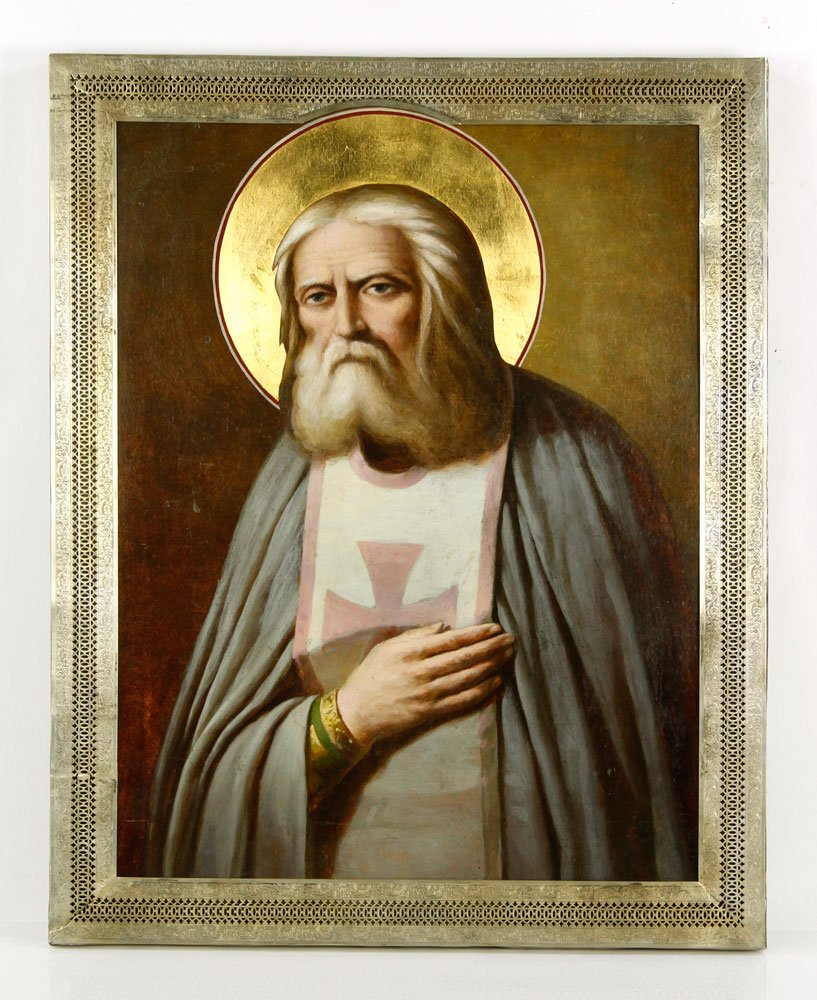 19th C. Russian Icon: 19th century Russian icon on wood panel and silver frame, "Serafim Sarovski, marked 88 (for .916 silver), AC 1892 St. George and the dragon (for Moscow) and maker's mark in Cyrillic, 20 1/8"h x 16 1/4