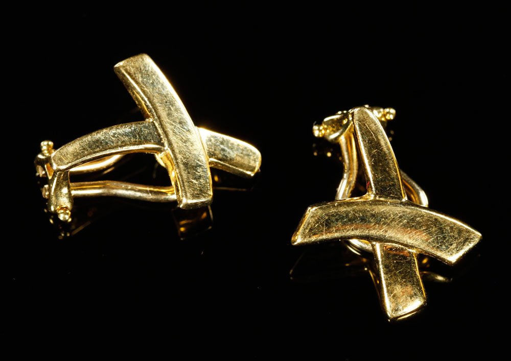 18K Tiffany and Co. Earrings: 18K Tiffany and Co. earrings, Paloma Picasso design, 5/8" dia, approximately .2 oz/ 3 DWT TW.