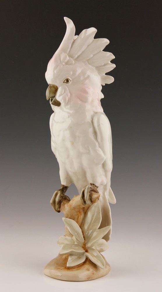 Royal Dux Porcelain Cockatoo: Royal Dux Czecklosolvakia porcelain cockatoo, 16" h x 5 1/2" w x 4" d. Provenance: From the estate of Raymond Bolduc of Fort Lauderdale, Florida and Ogunquit, Maine.