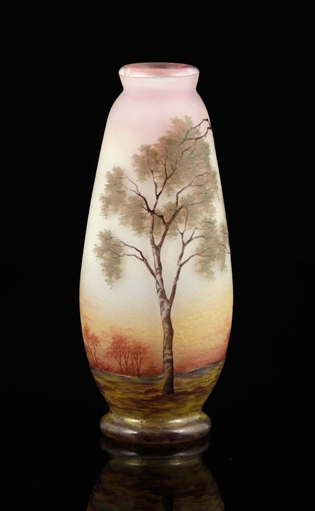 Glass Vase with Tree: Glass vase, marked Daum, decorated with a forested landscape, signed on bottom, 4 1/2" h. Provenance: From the unreserved collection of Mrs. Jackie Pearson of San Diego, California.