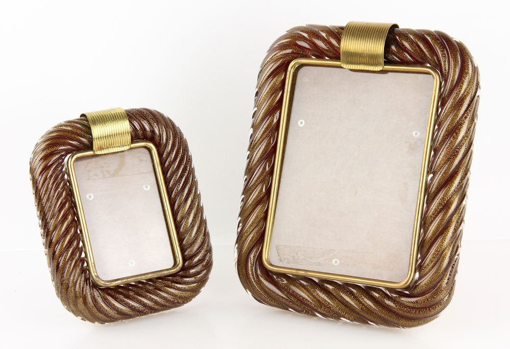 2 Italian Murano Glass Picture Frames: Lot of two Italian Murano glass picture frames, one 12" h x 9 1/2" w, the other 9" h x 7" w. Provenance: From the unreserved collection of Mrs. Jackie Pearson of San Diego, California.