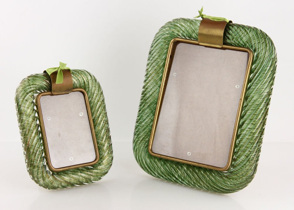 2 Italian Murano Glass Picture Frames: Lot of two Italian Murano green glass picture frames, one 12" h x 9 1/2" w, 9" h x 7" w. Provenance: From the unreserved collection of Mrs. Jackie Pearson of San Diego, California.