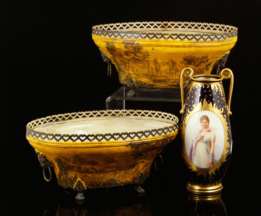 Pair French Tole Jardinières: Pair of French tôle peint jardinières, transfer decorated en grisaille with mounted figures in a forest landscape and embellished with leonine mask handles. Provenance: From the unreserved estate of