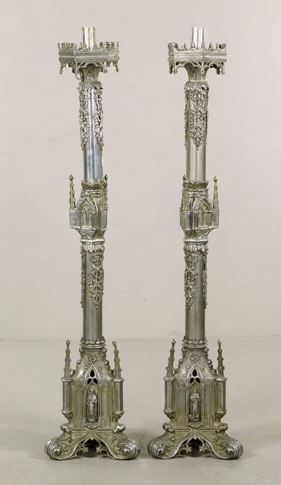 19th C. Gothic Brass Candlesticks: Pair of 19th century Gothic candlesticks, plated brass, 49" h x 10" dia. Provenance: From the unreserved collection of Mrs. Jackie Pearson of San Diego, California.