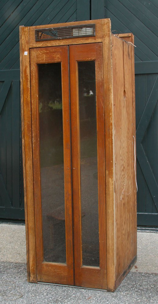 Vintage Wooden Telephone Booth: Vintage telephone booth, wood, 83"h x 30"w x 31"d. Provenance: From the Massachusetts estate of Robert Leslie, retired Lexington policeman.