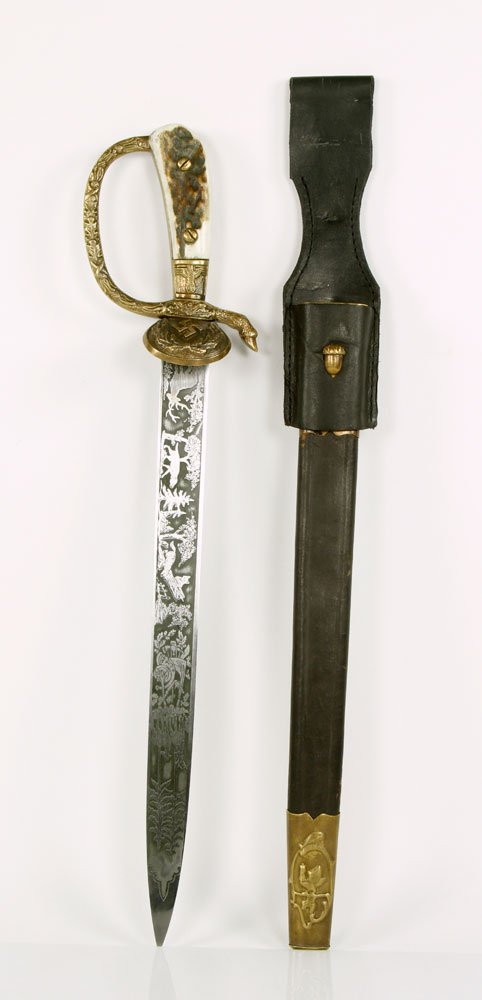 German Style Post WWII Hunting Dagger: German style post WWII later reproduction dagger, blade engraved with hunting scenes, inscribed "Gott Mit Uns," guard marked with Nazi insignia, hilt with figural hoof, 13" l blade, 17 1/4" l overall,