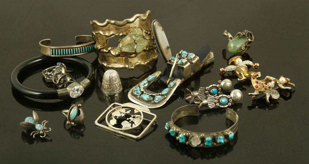 Lot of Silver Jewelry: Lot of jewelry, silver, including Southwest Native American pieces, agate ring, brooch, other rings, St. Peter's Basilica Rome thimble, and others, approximately 10.4 troy oz TW. Provenance: From a Ne