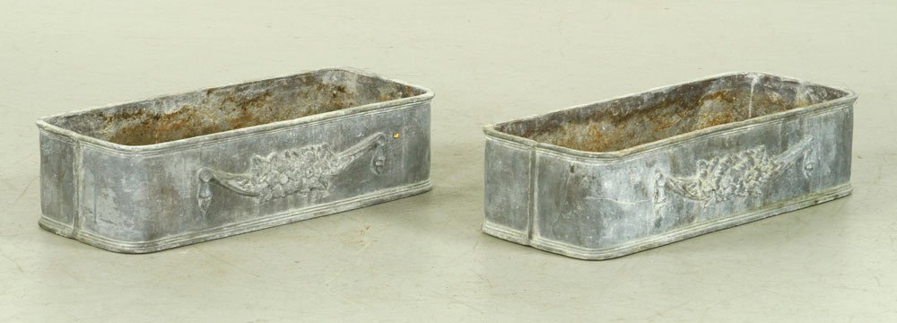 Pair of Lead Planters: Pair of planters, lead, 6 1/2" h x 23" l x 5 1/2" w. Provenance: From a Massachusetts estate.