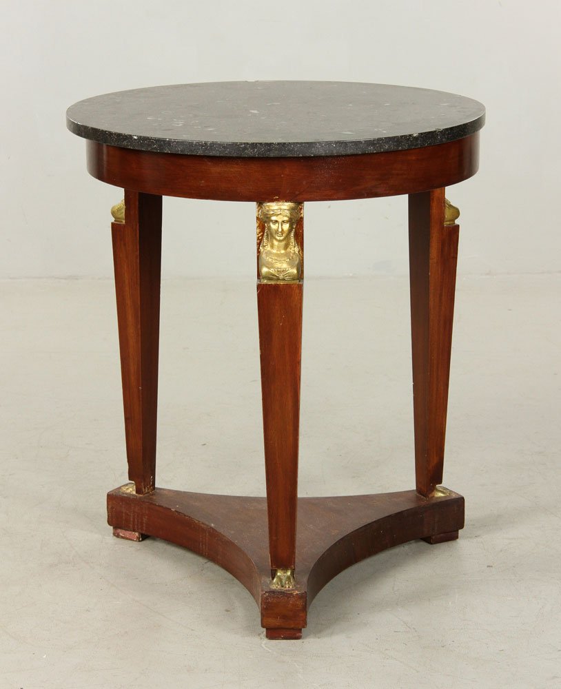 French Empire Table: French Empire round table, mahogany, with marble top and figural mount, 24" h x 24" dia.