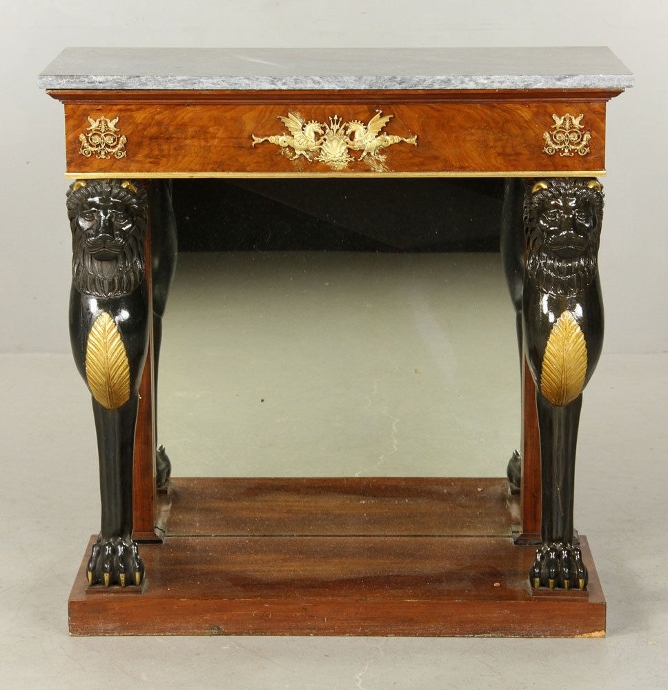 19th C. Empire Pier Table: 19th century Classical Empire pier table, mahogany, with marble top, legs with gold decorated lions heads, 35" h x 33" w x 16" d.
