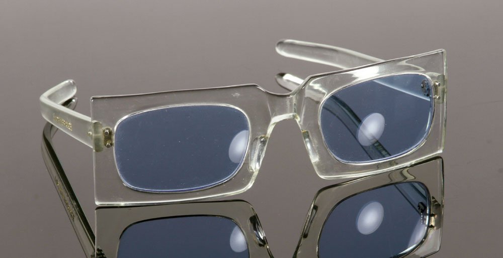 Mid 20th C. Pierre Cardin Sunglasses: Mid 20th century Pierre Cardin sunglasses, made in France, clear frames and blue lenses. Provenance: From a Massachusetts collection.