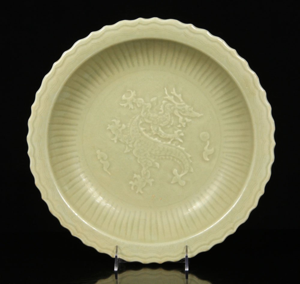 Chinese Longquan Plate: Chinese Longquan plate, porcelain, with dragon motif, Ming Dynasty, 14" dia. Provenance: from a Connecticut collection.