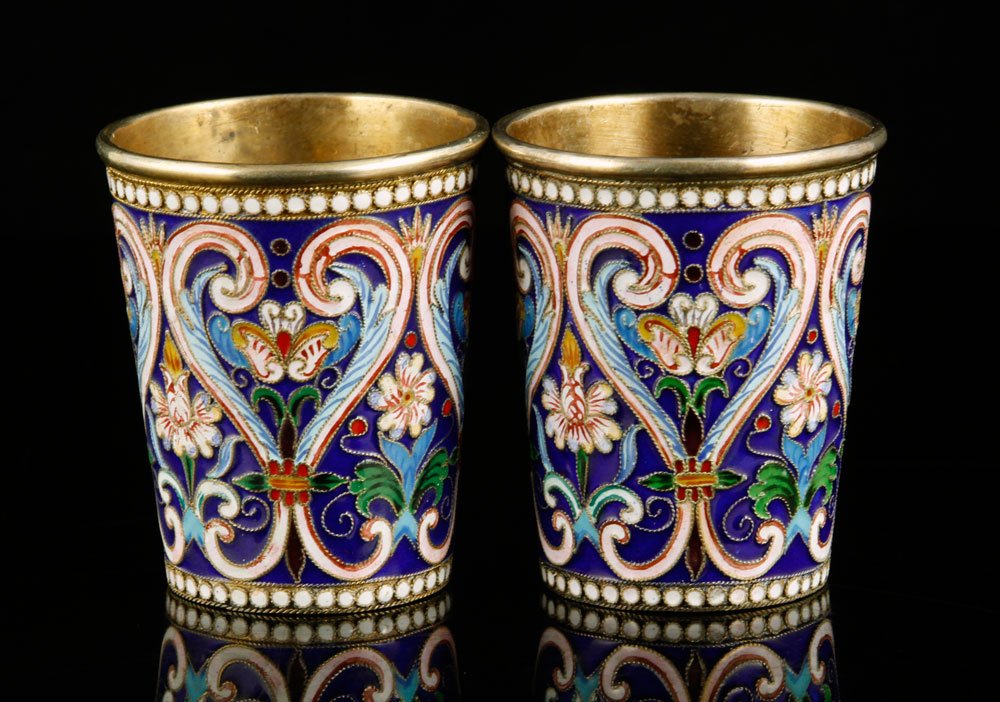 Pair of Russian Silver and Enamel Vodka Cups: Pair of Russian vodka cups, .84 silver, with enamel, with initials in Cyrillic, 2 1/4" h, approx. 4.5 troy oz. total weight. Provenance: from a New York collection.