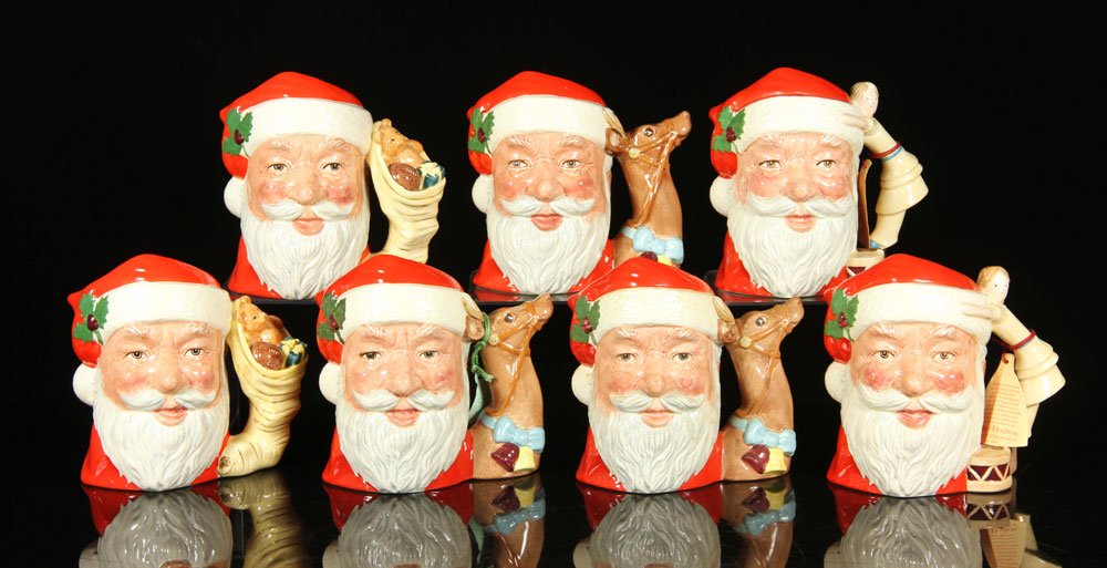 Set of 7 Royal Doulton Santa Mugs: Set of seven Royal Doulton mugs, porcelain, featuring Santa Claus. Provenance: from a New Hampshire estate.