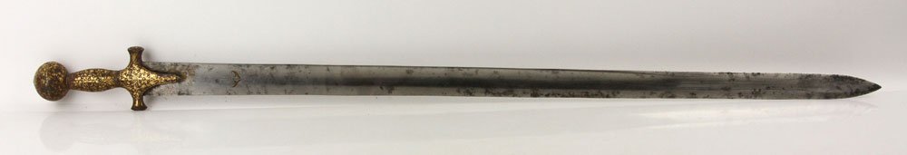 Straight Tulwar, Indian: Unusual straight tulwar, Indian, gold over steel hilt, maker's mark on blade, no scabbard; 30" l (blade), 35" l (overall). Provenance: From the unreserved Vincent J. Vabri Edged Weapon Collection.