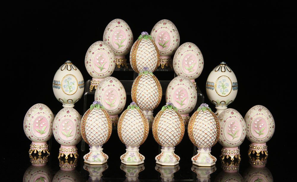 Lot of 18 Cybis Eggs, Porcelain: Lot of eighteen Cybis eggs, porcelain, 6" h. Provenance: From a New Hampshire estate.