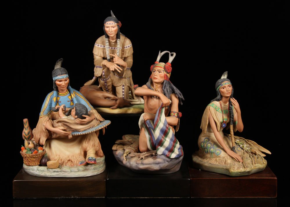 Cybis, Lot of 4 Figures: Lot of four Cybis figures of Native Americans, porcelain, tallest 13" h (including base). Provenance: From a New Hampshire estate.