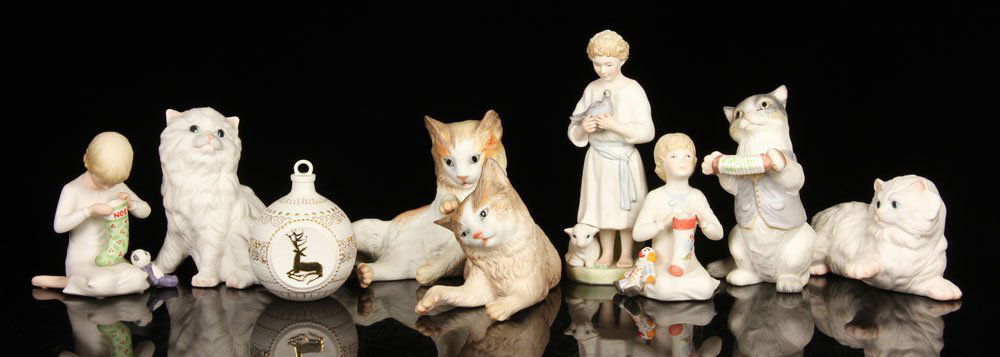 Lot of 8 Cybis Figures: Lot of eight Cybis items, to include: kittens playing, musical cat, holiday children, Christmas ornament, and more; largest 6" h x 10 1/2" w. Provenance: From a New Hampshire estate.