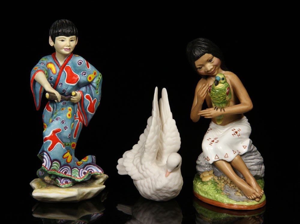 Lot of 3 Porcelain Figures: Lot of three figures, porcelain, to include: "Thrump-o-Moto" by Connoisseur of Malvern, 7 1/2" h; "South American Child" by Boehm, 6 1/2" h; and one white dove by Cybis, 4 1/4" h. Provenance: From a N
