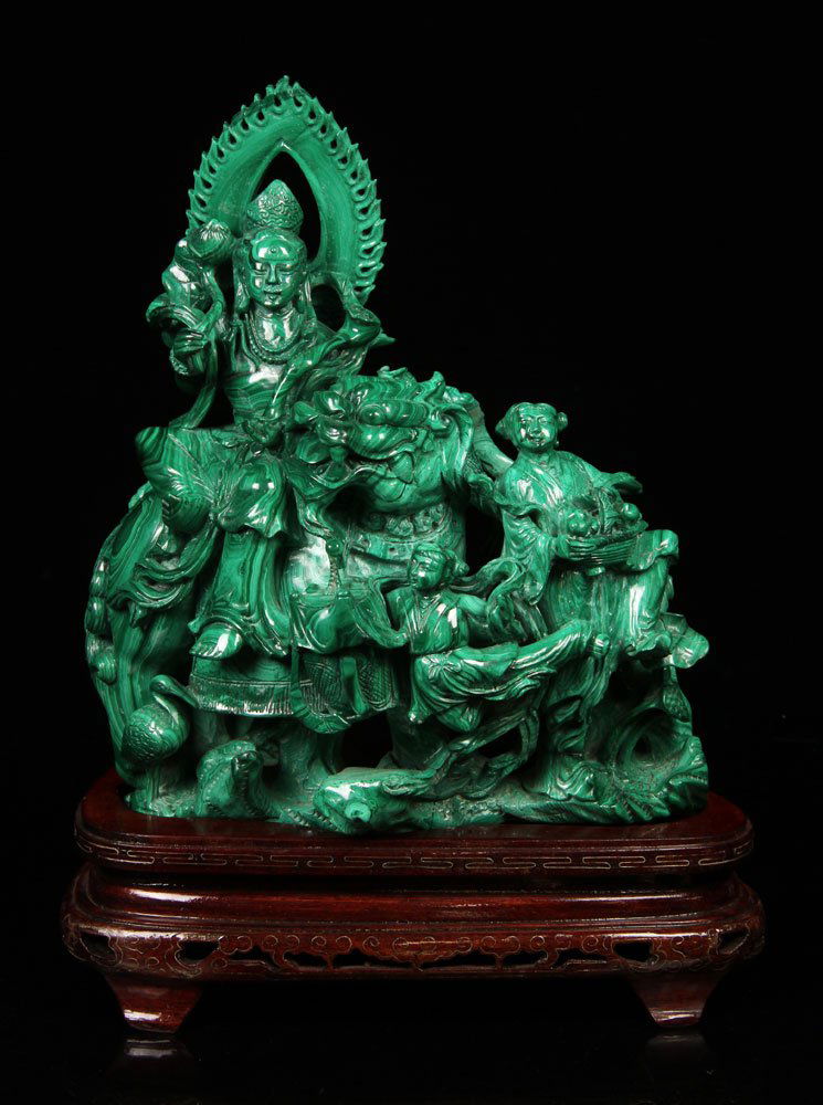 Carved Buddha Figural Group, Malachite: Large carved figural group, malachite, depicting Buddha riding mythical creature, cranes, and other figures, with stand, boxed; 11" h x 10" l, 13 1/2" h (with base). Provenance: From a New Hampshire e
