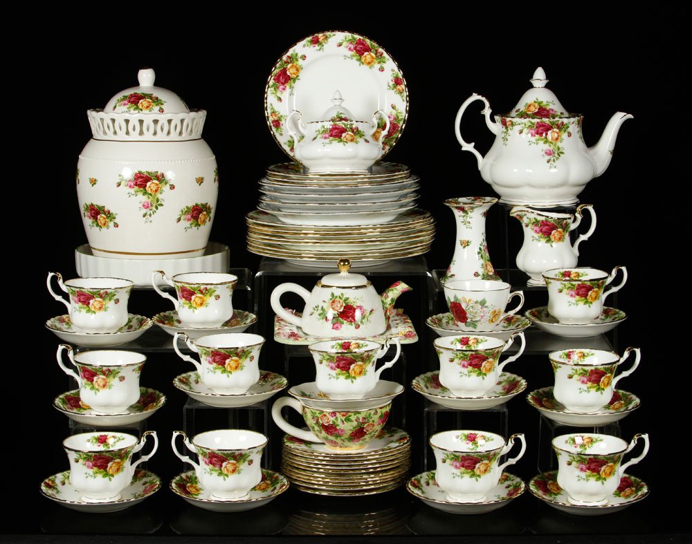 Large Set of Royal Albert Bone China: Large assorted set of Royal Albert bone china, "Old Country Rose" pattern, to include: teacups and saucers, one large covered jar, creamer, sugar, plates of varying sizes, small and large teapots, and